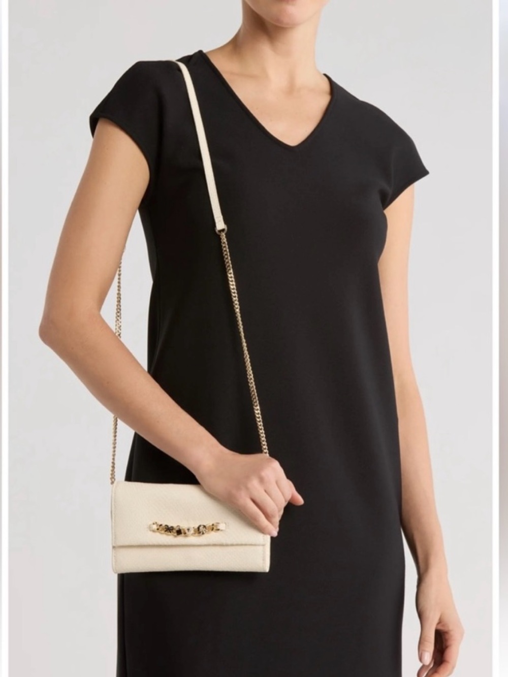 Ted Baker London Evie Charm Leather Clutch
$150
Color: Textured White/Bone